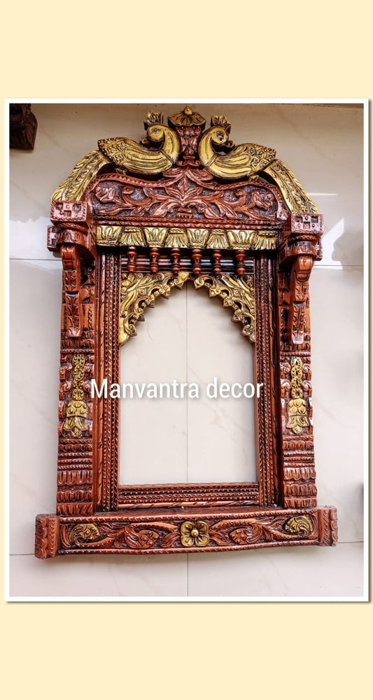 Jharokha in teak wood painted in permanent colours.