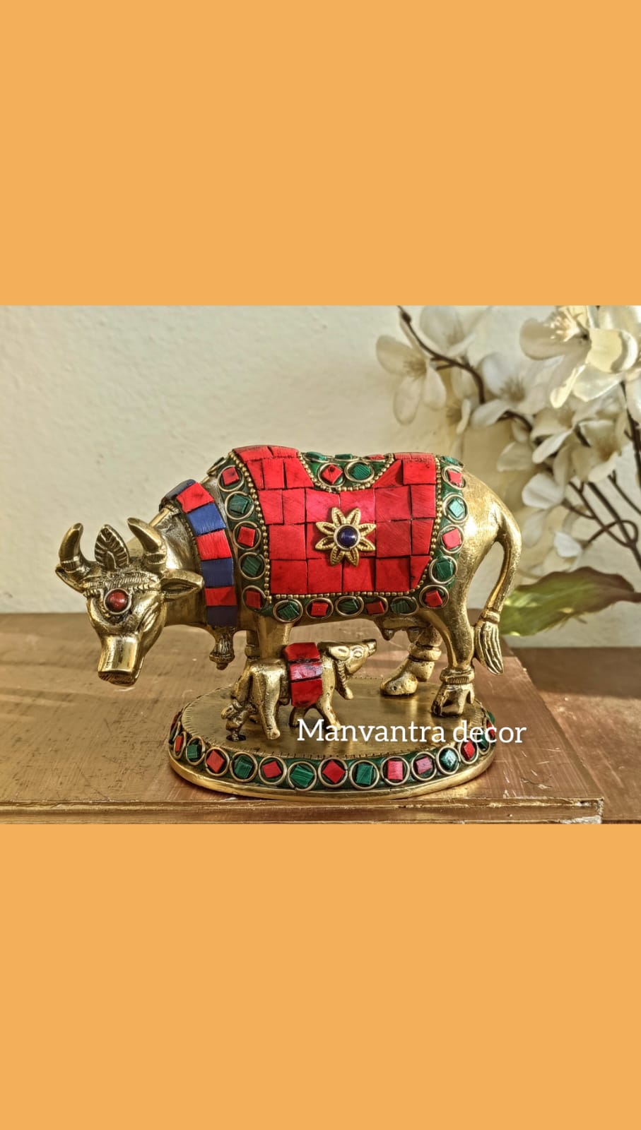 Cow calf with stonework.