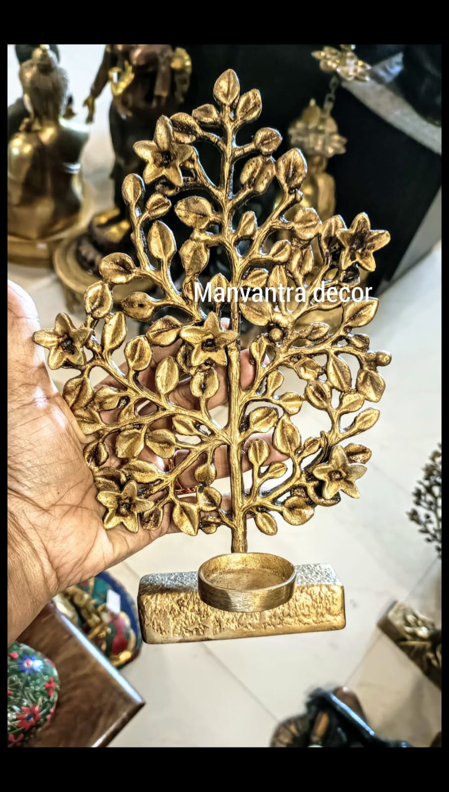 Tree stand with tealight candle holder.