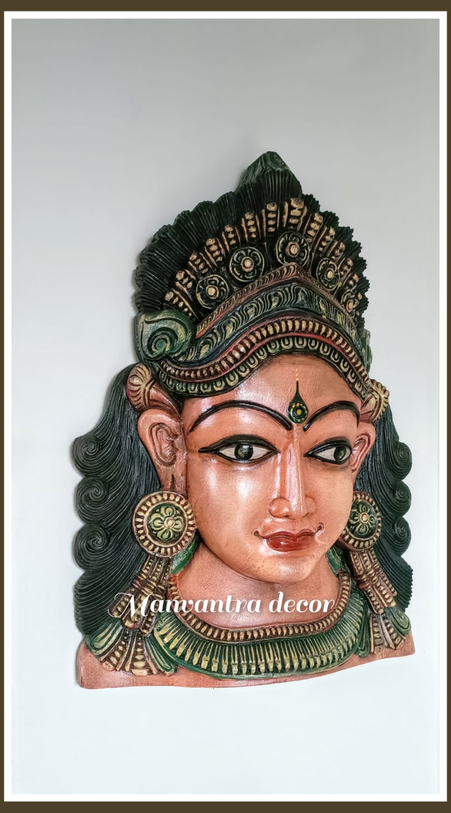 Indonesian lady face sculpture