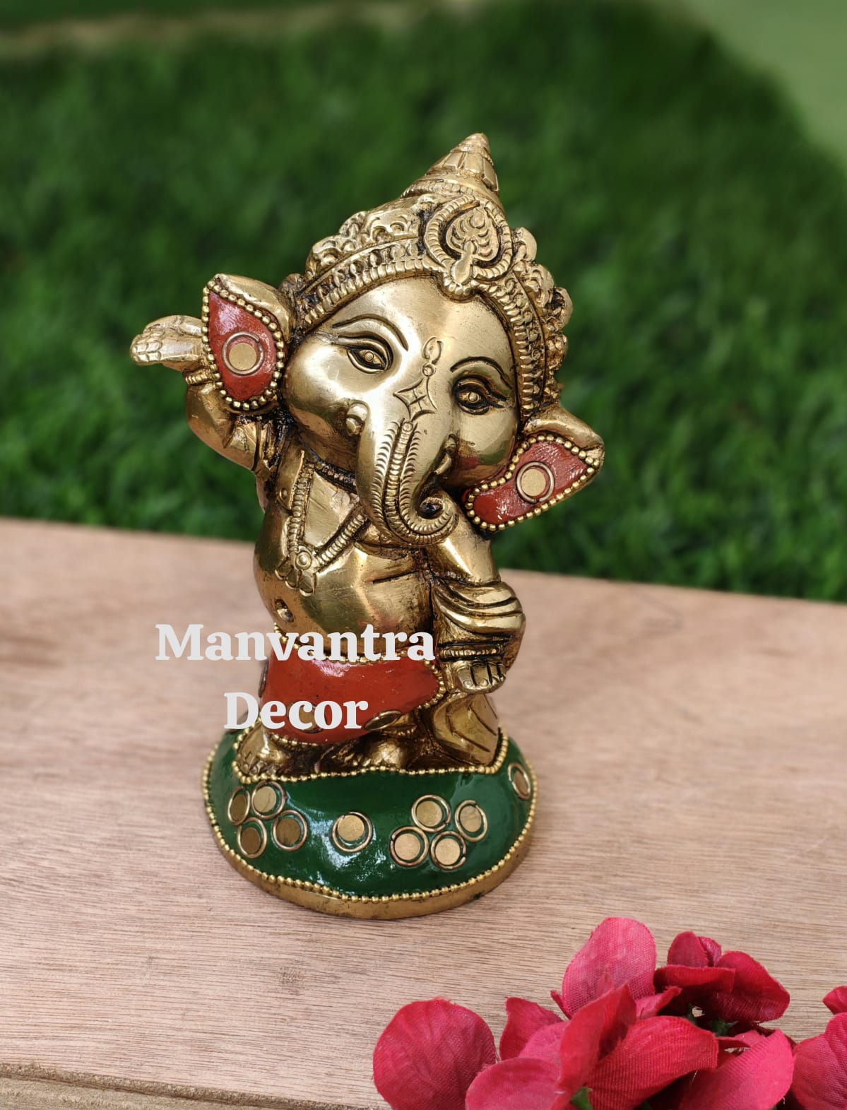 Cute baby Ganesha in brass with unique stonework