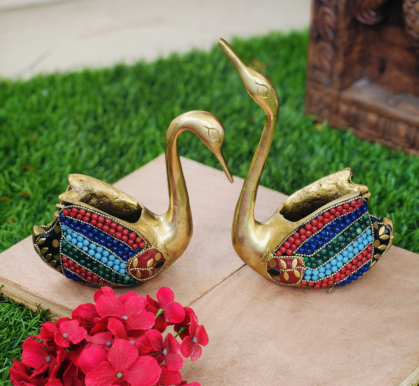 Swan set in pure brass studded with beautiful stonework.