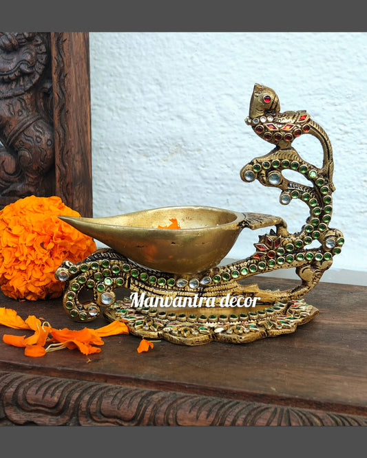 Bird Deepak with special stonework.