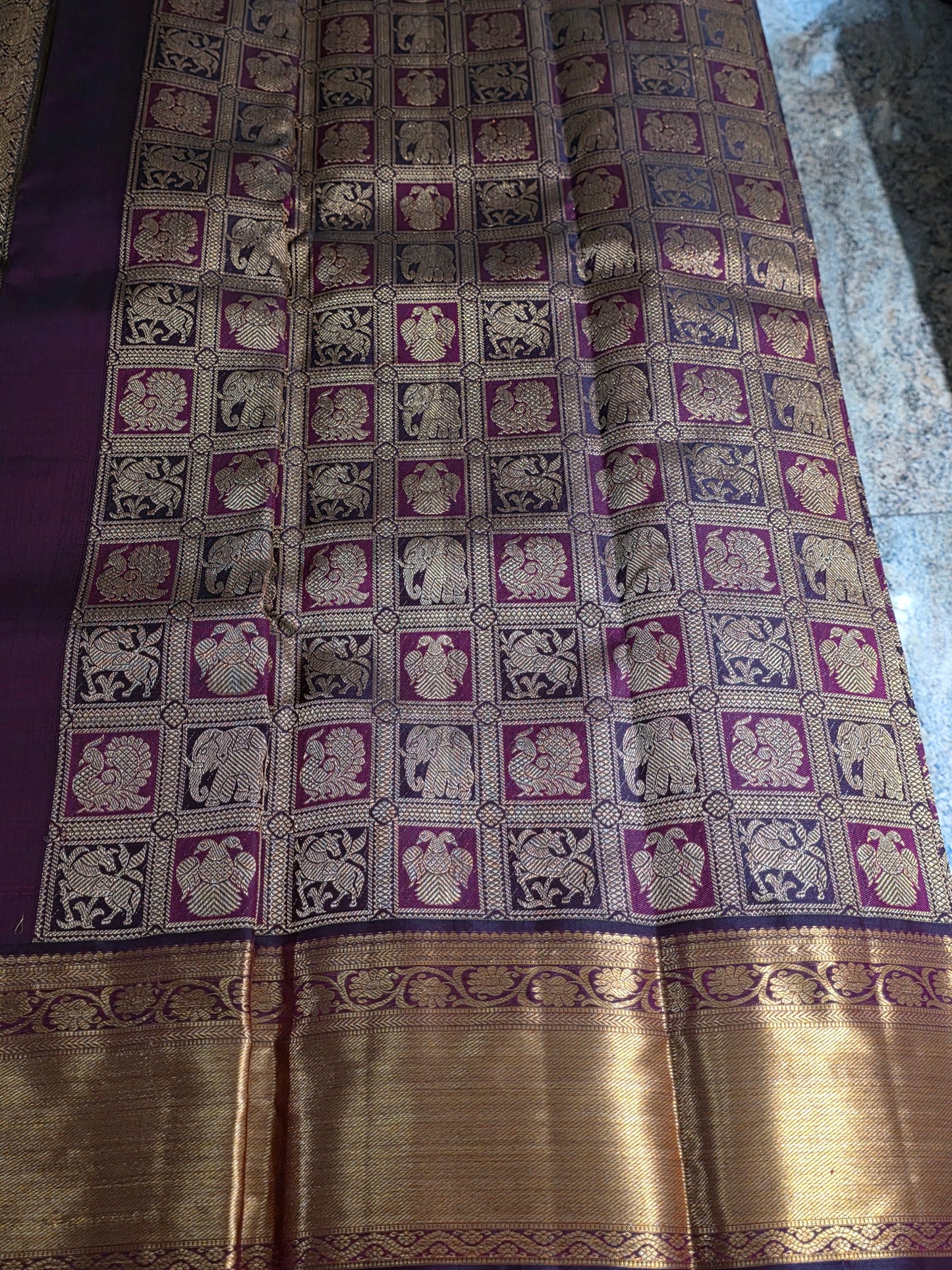 Pure Mulberry brown and maroon dual tone colour silk saree with pure zari completely hand woven.