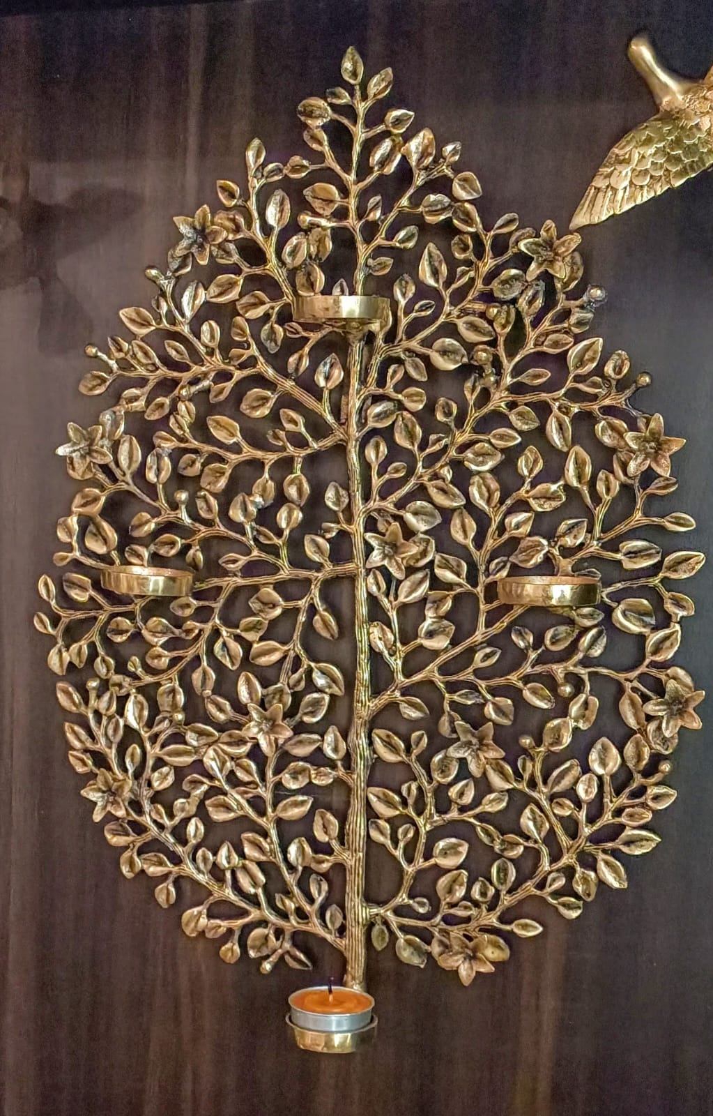 Decorative tree wall hanging with candle holders..
