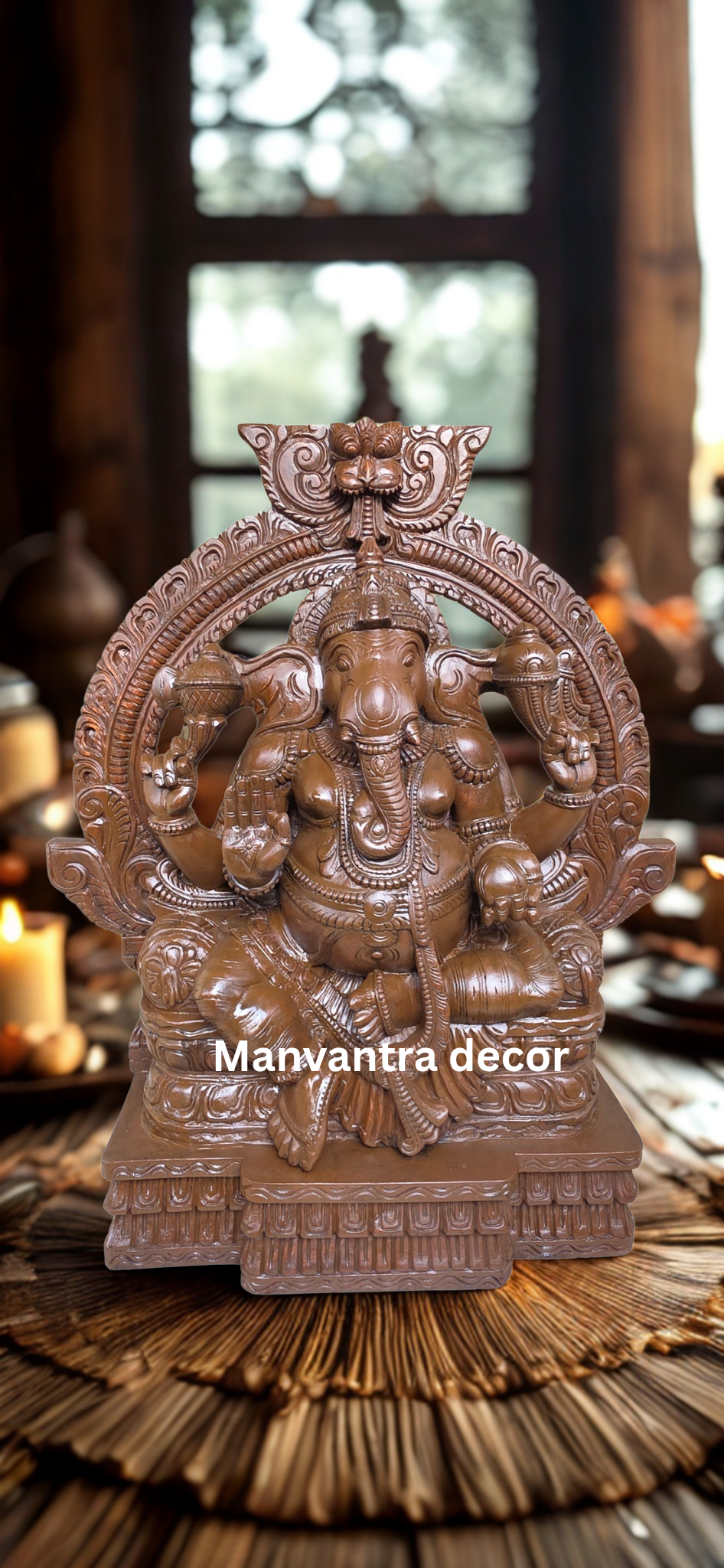 Ganesha idol in solid wood