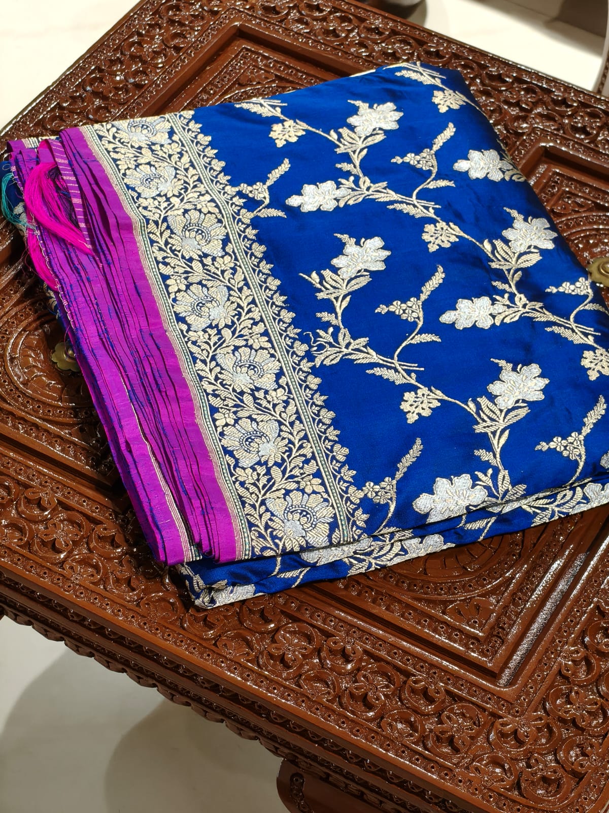 Pure Mulberry silk blue with golden and silver zari work throughout the saree. 100% pure silk with pure zari completely hand weaved