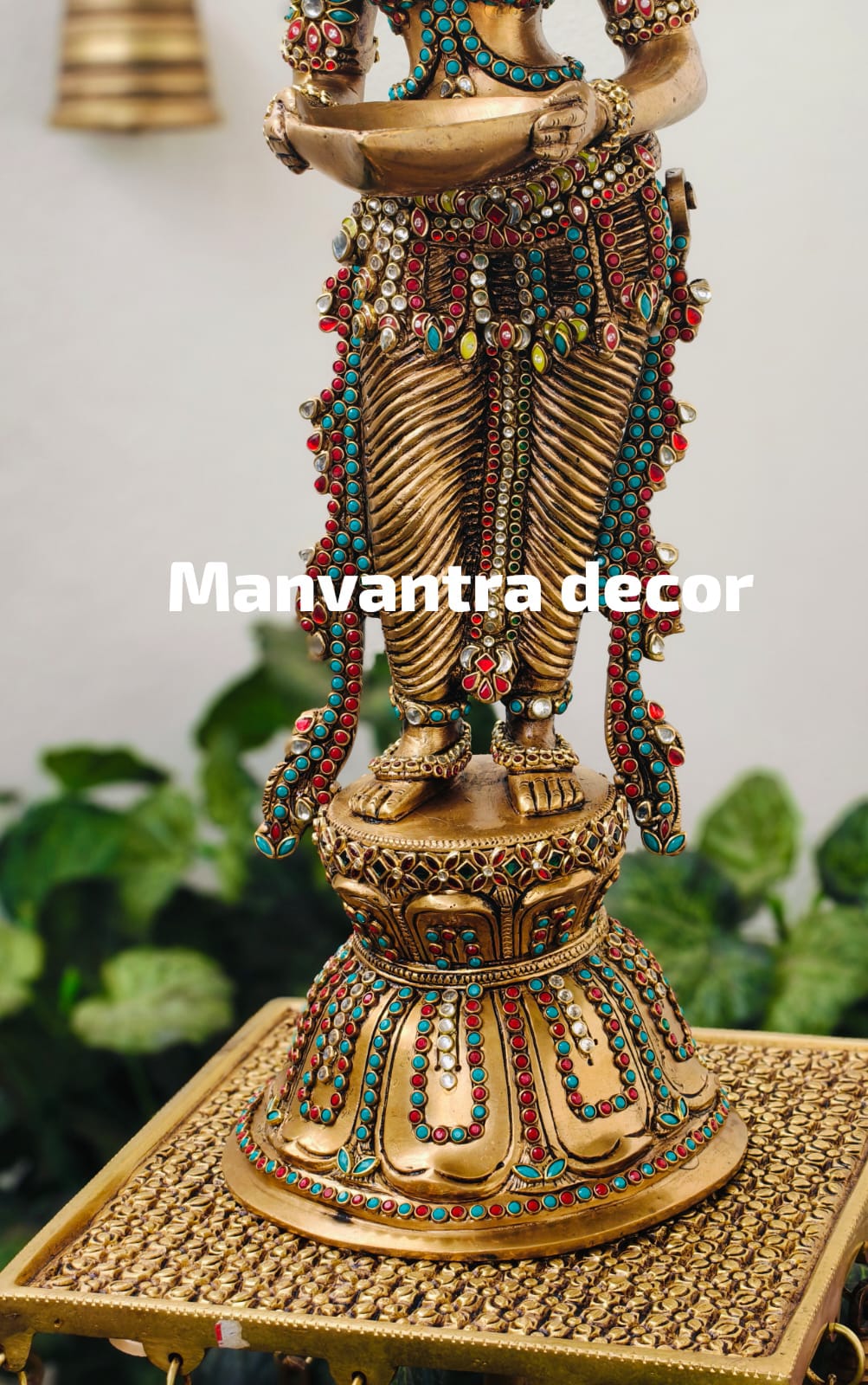 Deeplady in pure brass with stonework