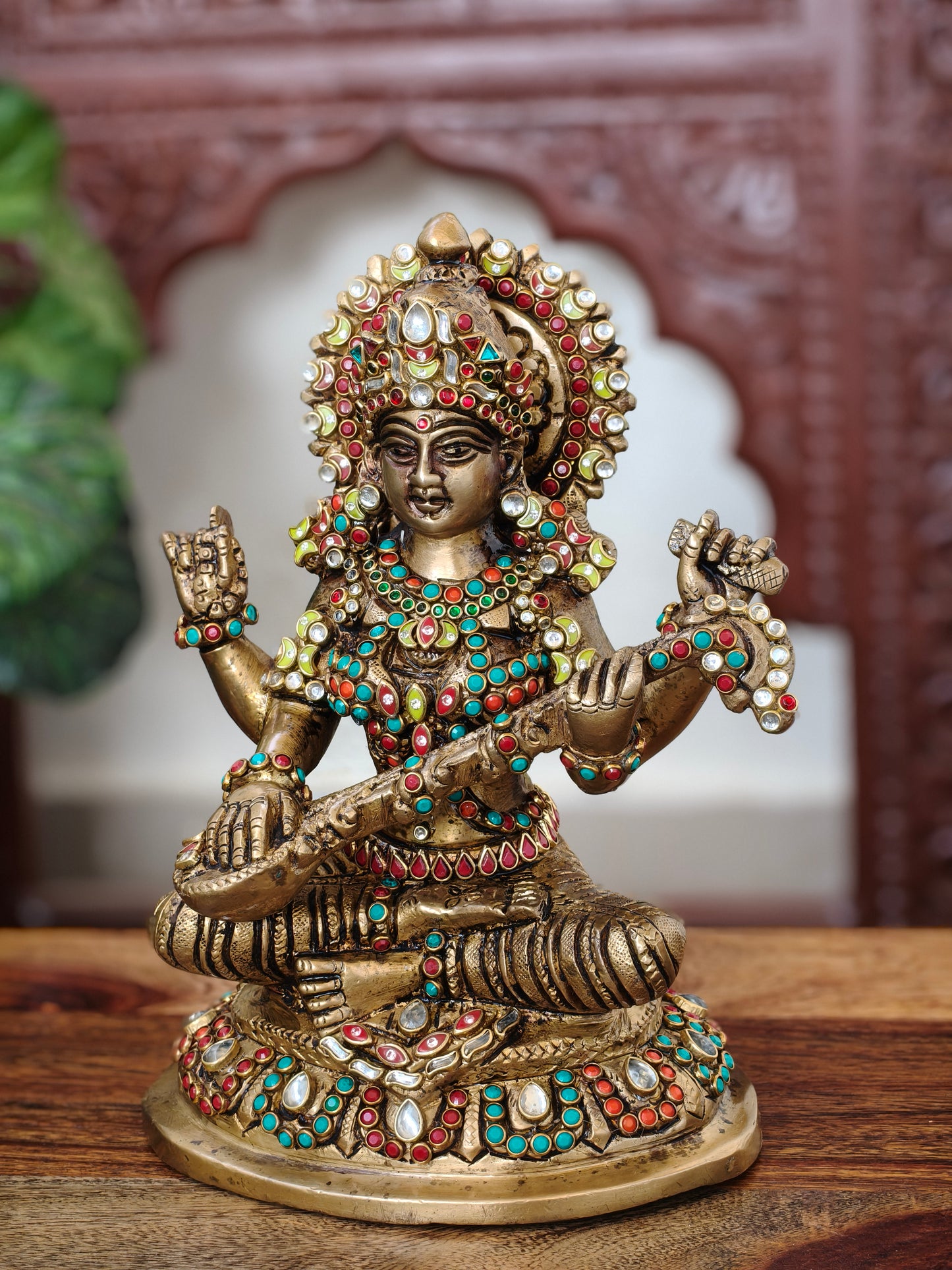 Godess saraswati idol in brass with special stonework done by hand