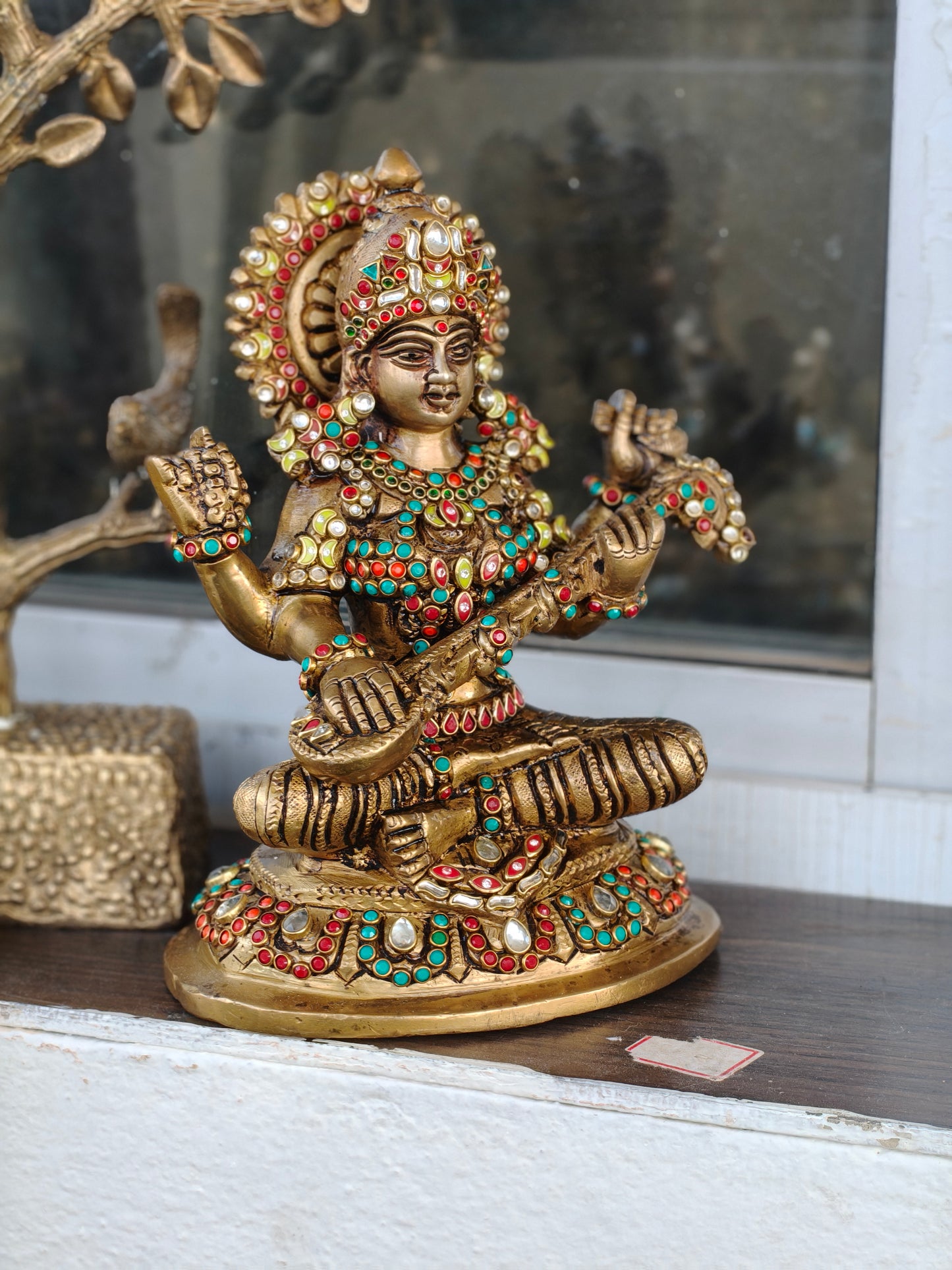 Godess saraswati idol in brass with special stonework done by hand