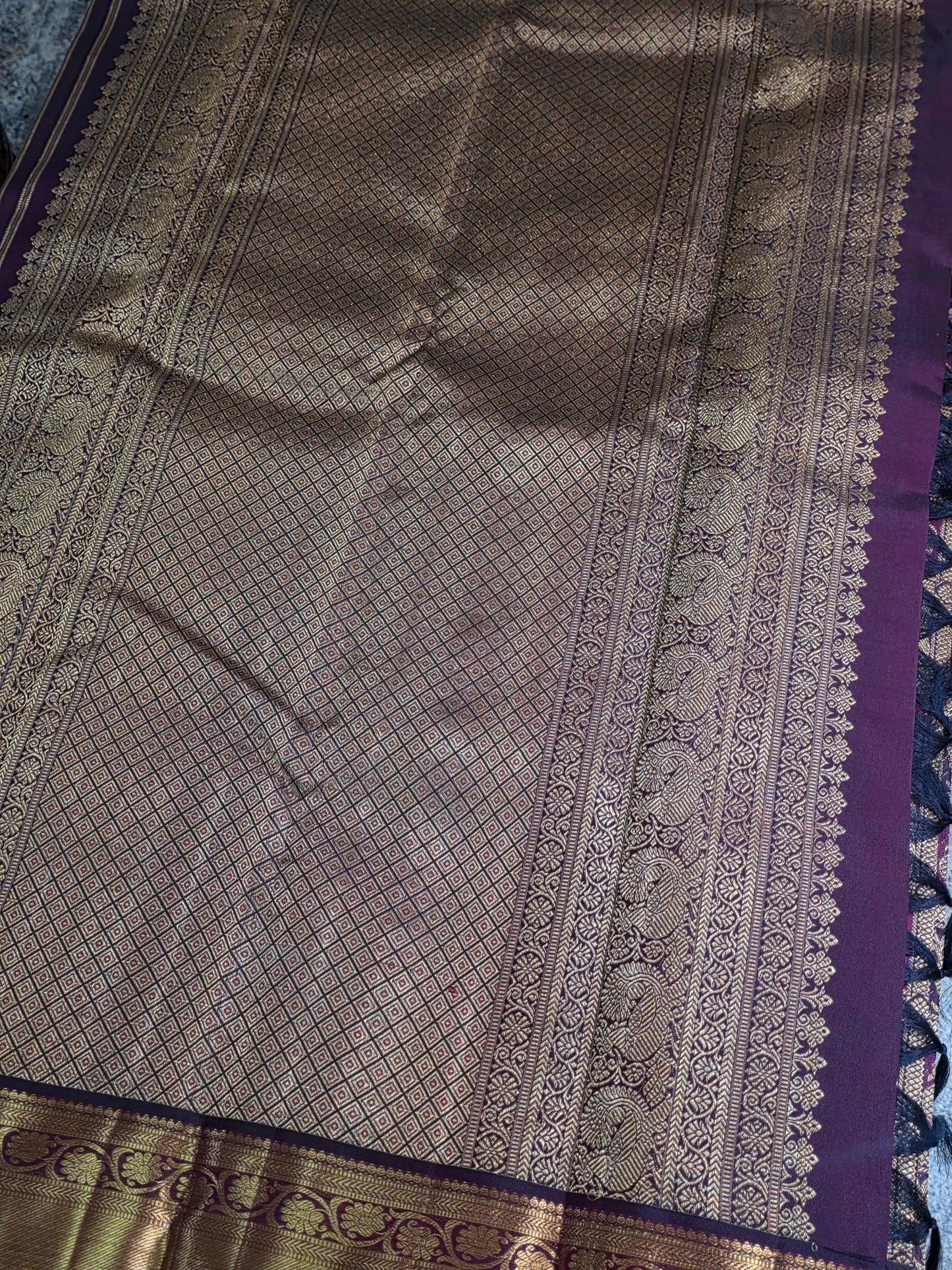 Pure Mulberry brown and maroon dual tone colour silk saree with pure zari completely hand woven.