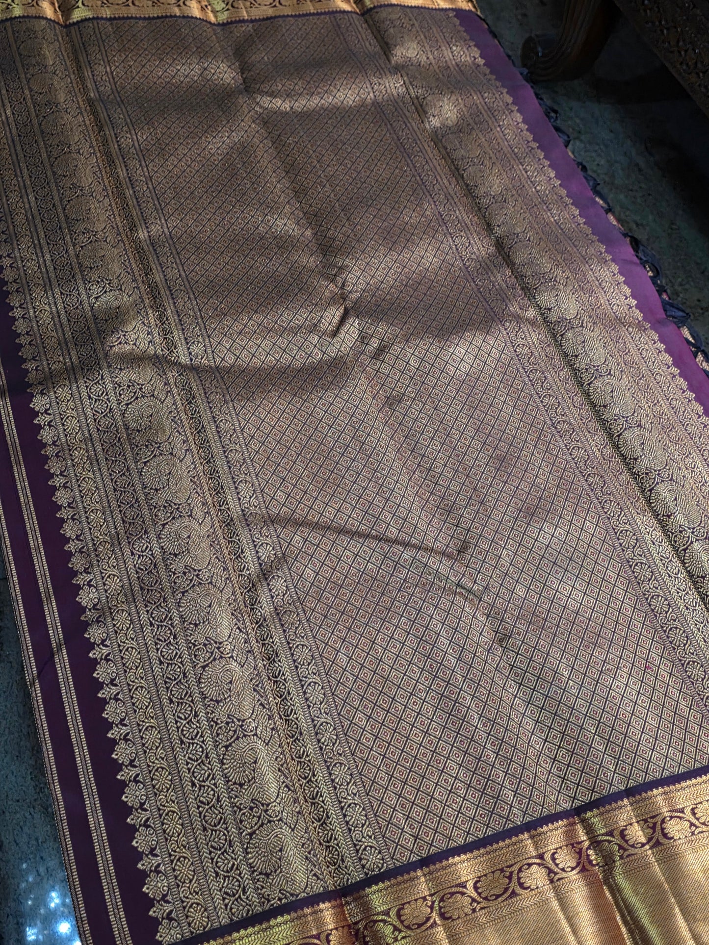 Pure Mulberry brown and maroon dual tone colour silk saree with pure zari completely hand woven.