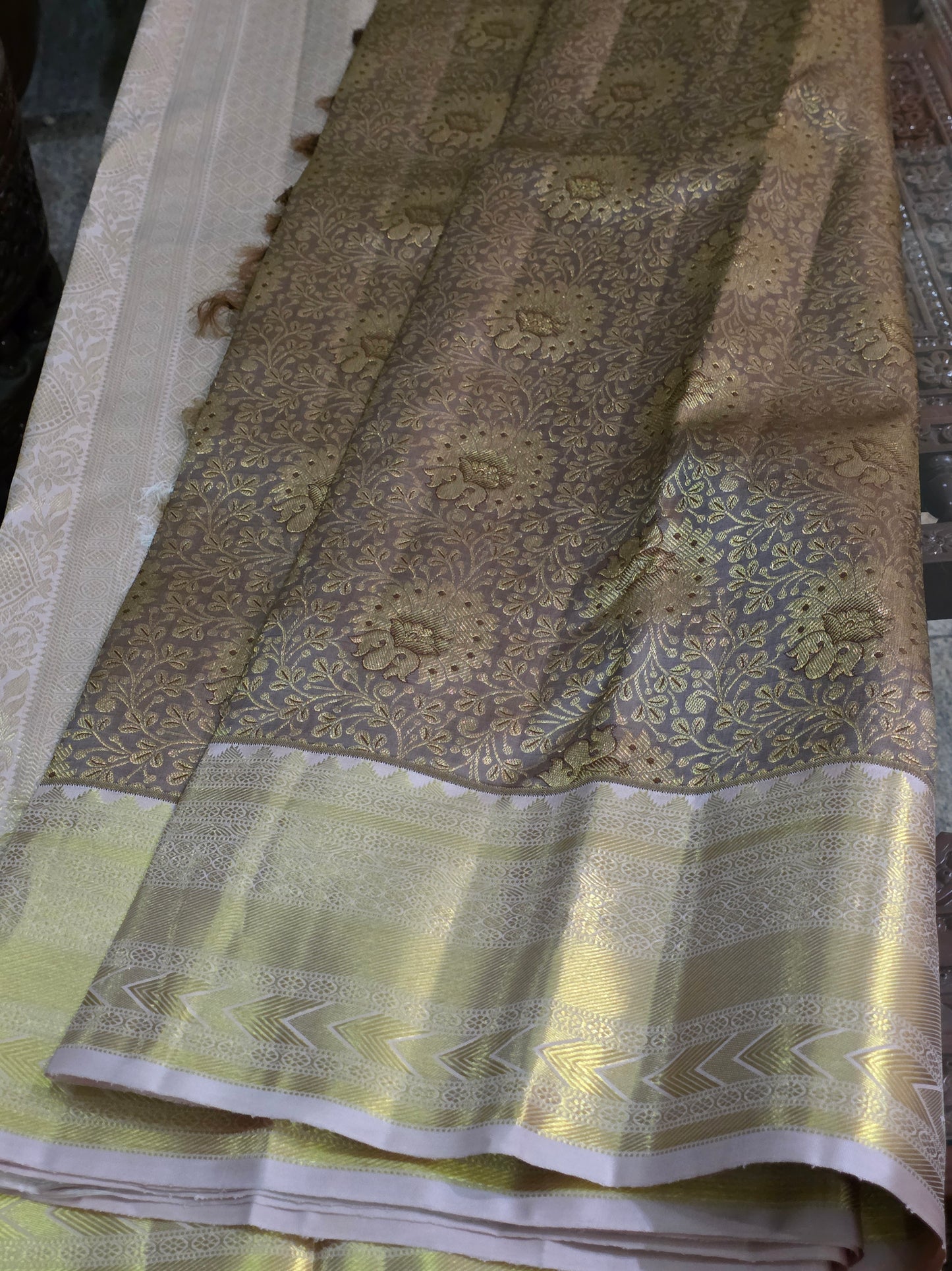 Pure Mulberry silk saree light grey and gilden colour with pure zari completely hand woven.