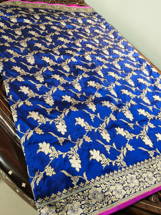 Pure Mulberry silk blue with golden and silver zari work throughout the saree. 100% pure silk with pure zari completely hand weaved