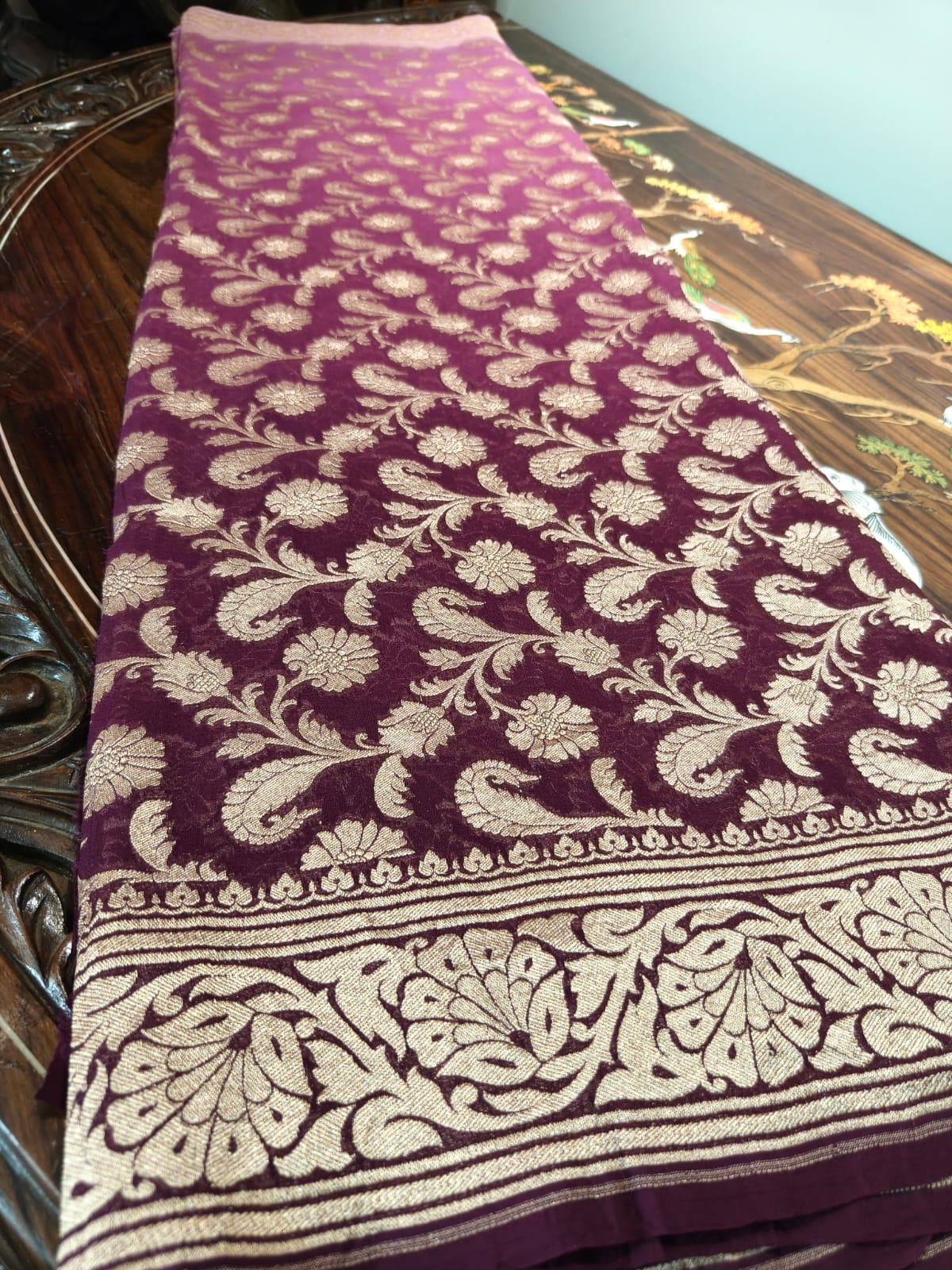 Pure silk wine colour saree in sheer and breathable silk completely hand weaved and pure zari