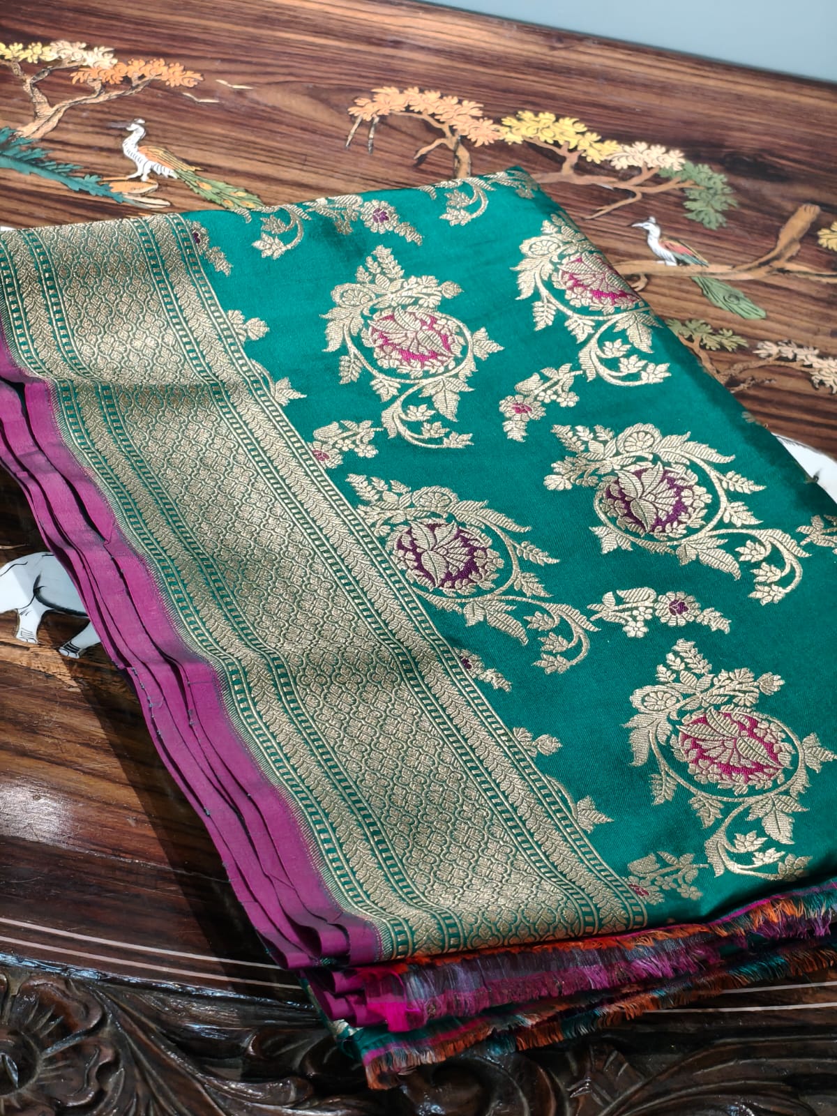 Pure Mulberry silk green with golden and silver zari work throughout the saree. 100% pure silk with pure zari completely hand woven