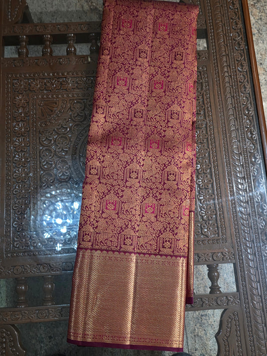 Pure Mulberry rust colour dual tone silk saree with pure zari completely hand woven.