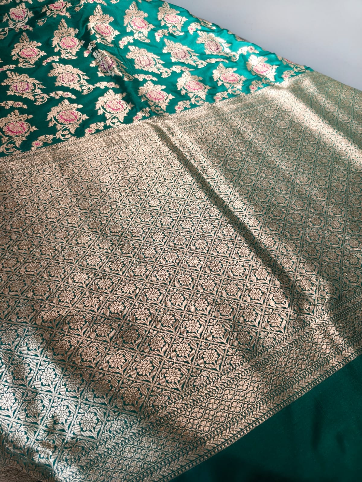 Pure Mulberry silk green with golden and silver zari work throughout the saree. 100% pure silk with pure zari completely hand woven