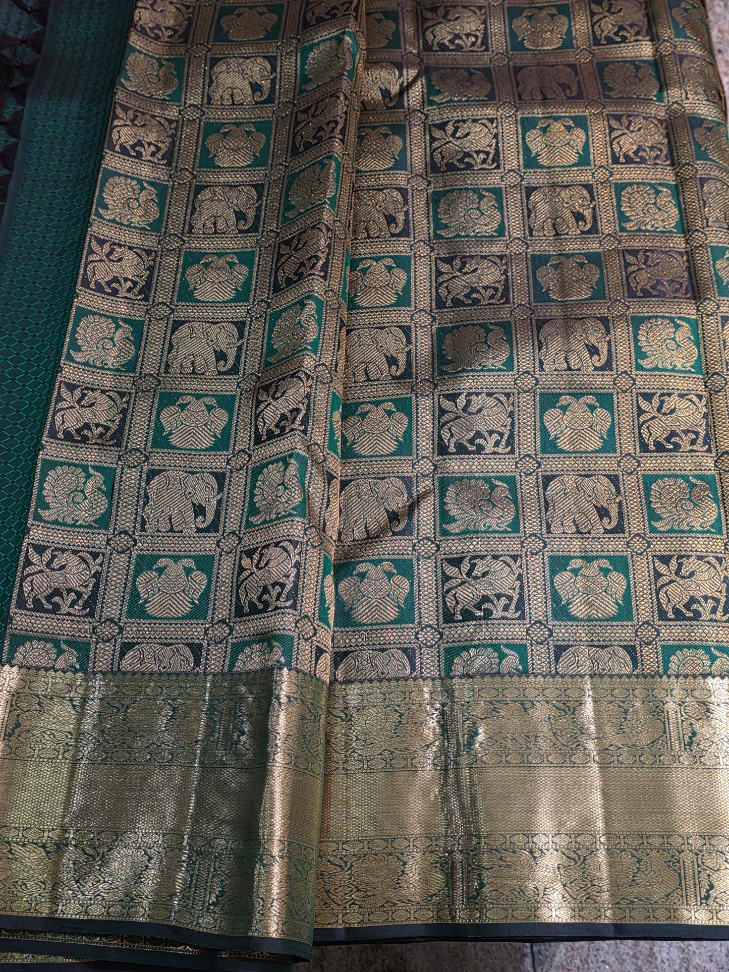 Pure Mulberry dual tone green colour silk saree with pure zari completely hand woven.
