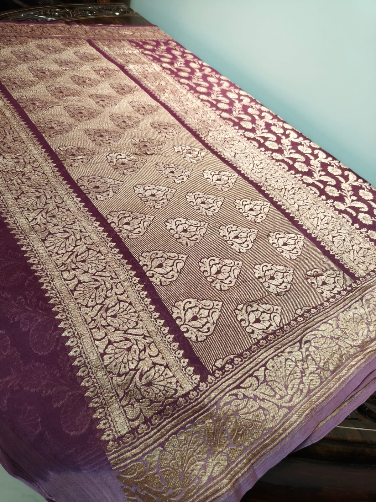 Pure silk wine colour saree in sheer and breathable silk completely hand weaved and pure zari