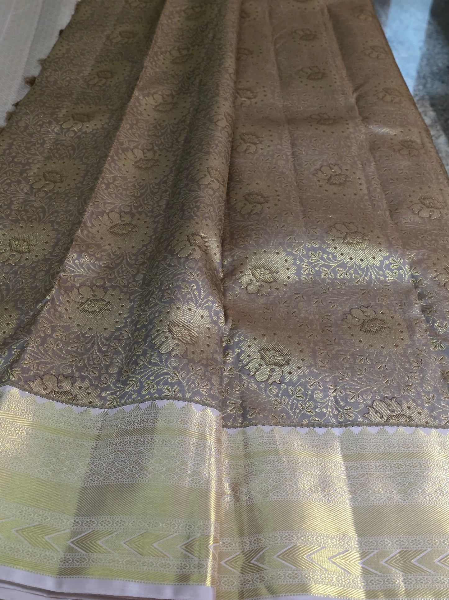 Pure Mulberry silk saree light grey and gilden colour with pure zari completely hand woven.