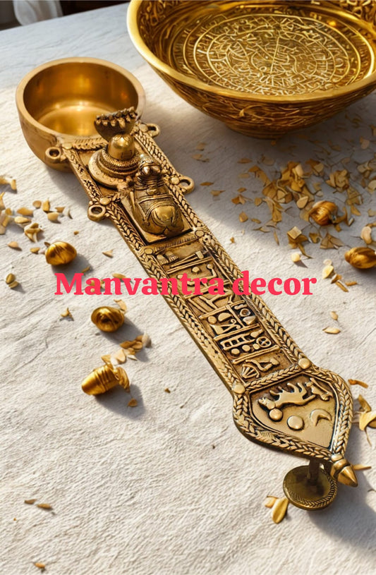 Pure brass uddharani, ritual spoon with shivling, nandi.