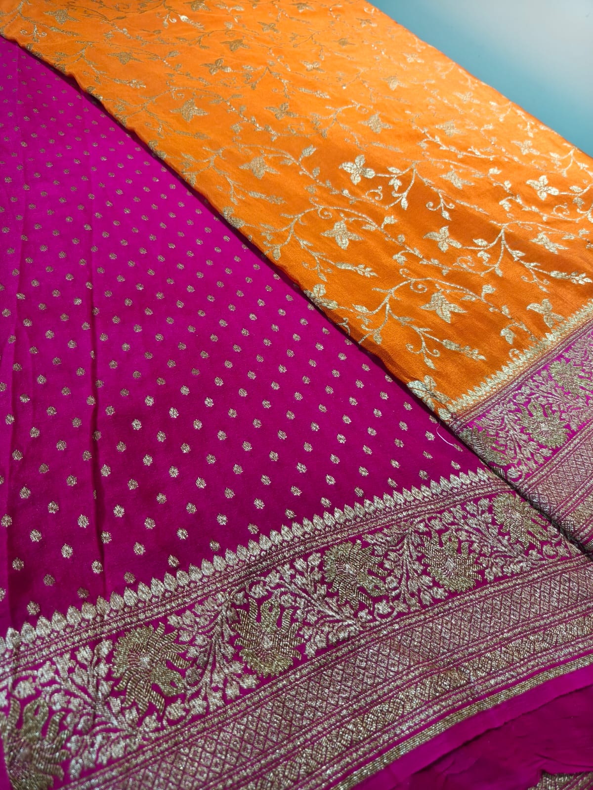 Pure crepe orange silk saree in sheer and breathable silk completely hand woven with pure zari