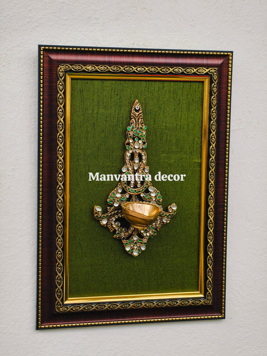 Wall frame with brass deepak  in brass (stonework)