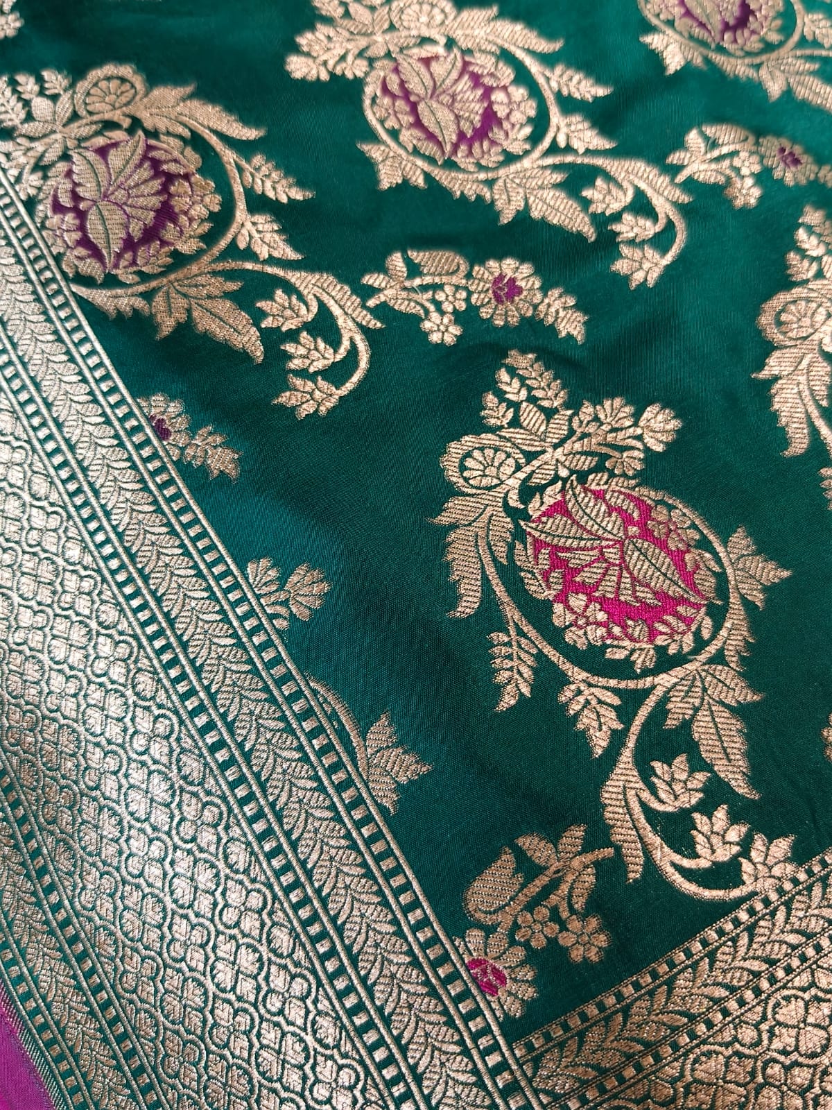 Pure Mulberry silk green with golden and silver zari work throughout the saree. 100% pure silk with pure zari completely hand woven