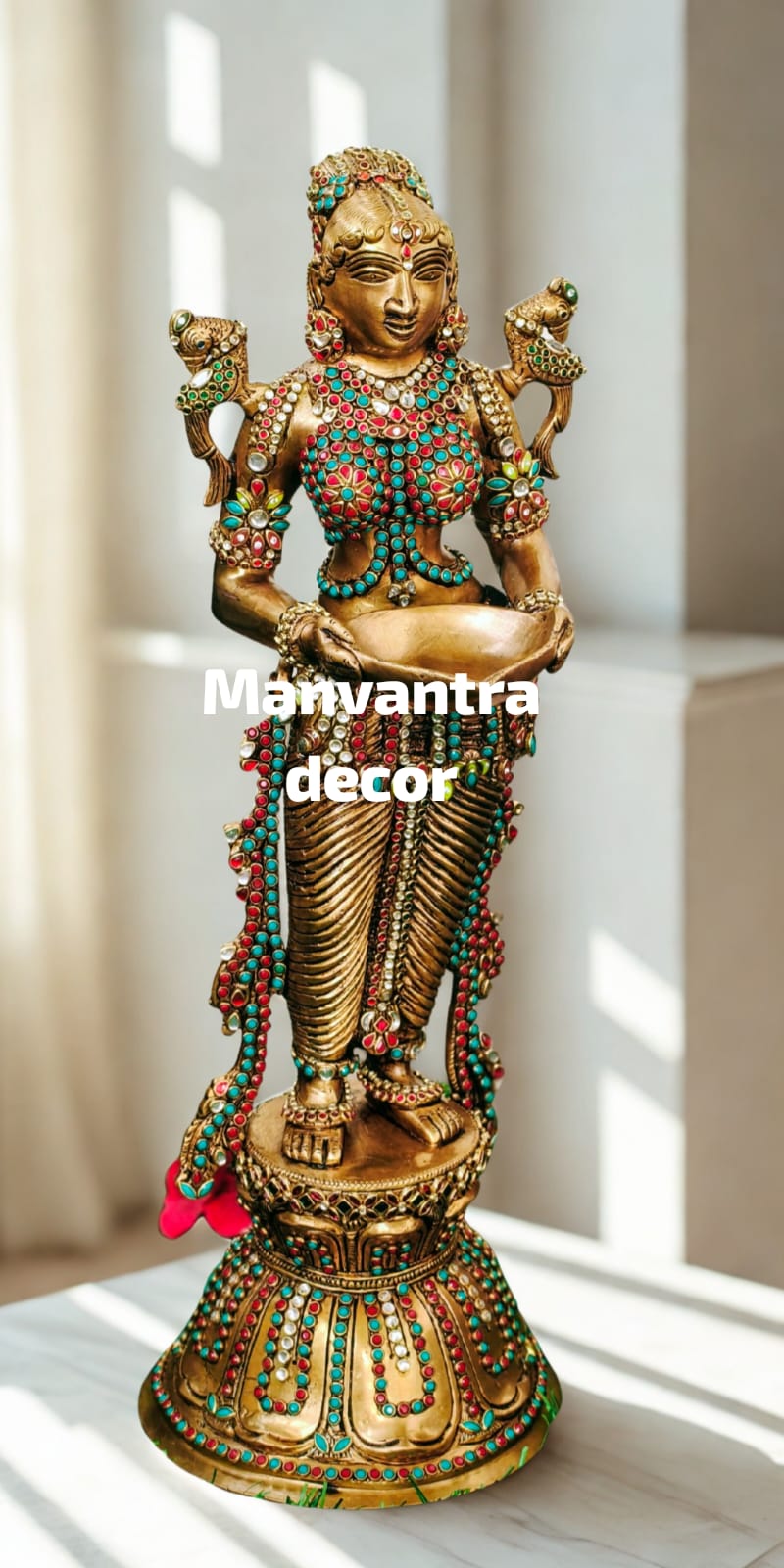 Deeplady in pure brass with stonework