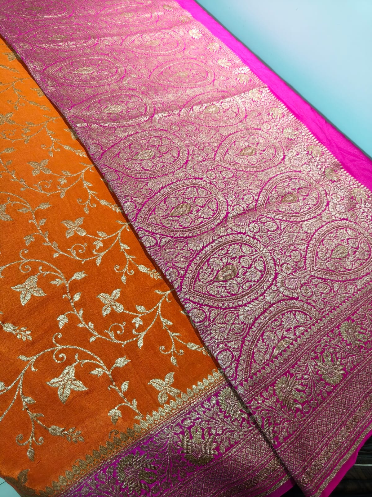 Pure crepe orange silk saree in sheer and breathable silk completely hand woven with pure zari