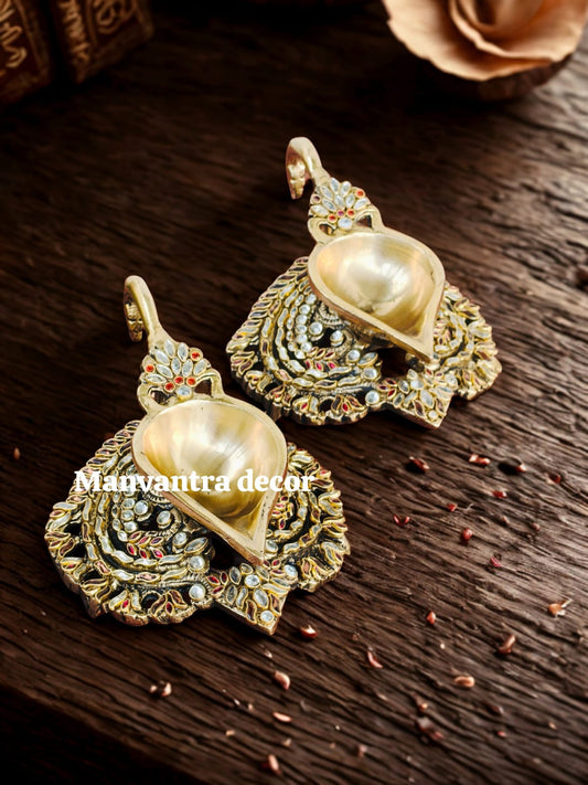 Beautiful shimmering deepams in brass studded with special stone work by hand (pair)