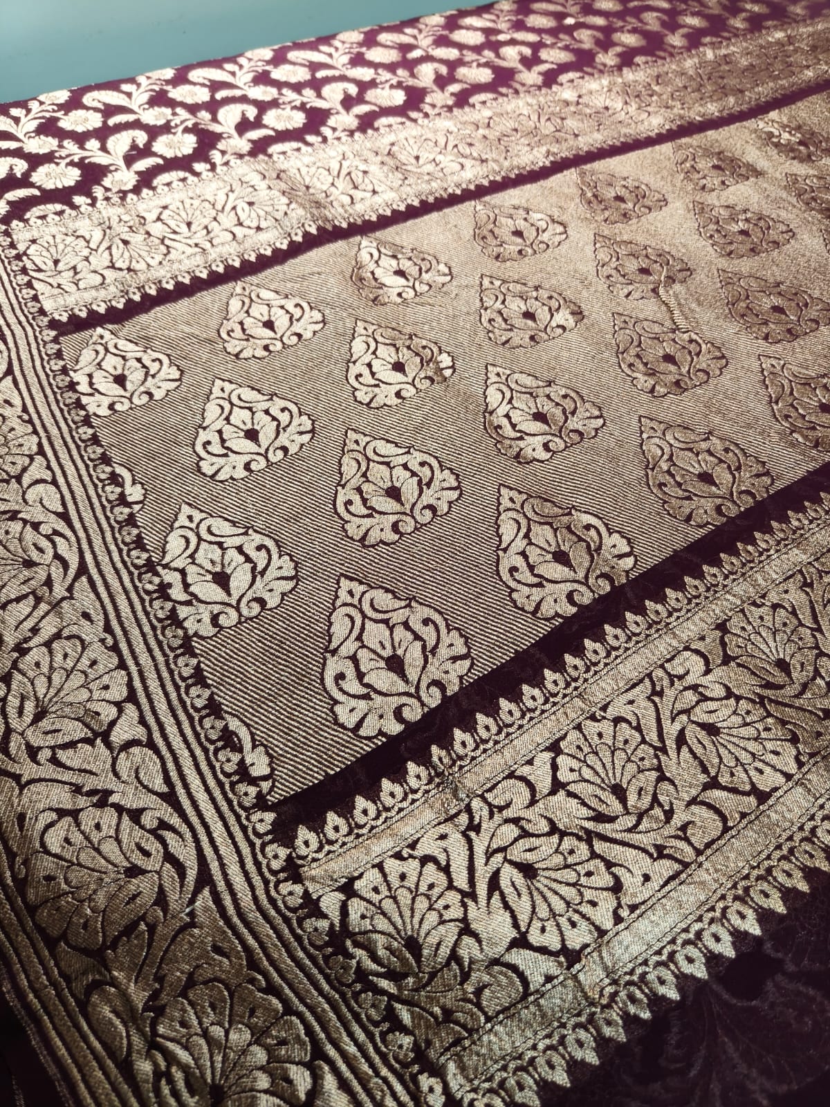 Pure silk wine colour saree in sheer and breathable silk completely hand weaved and pure zari