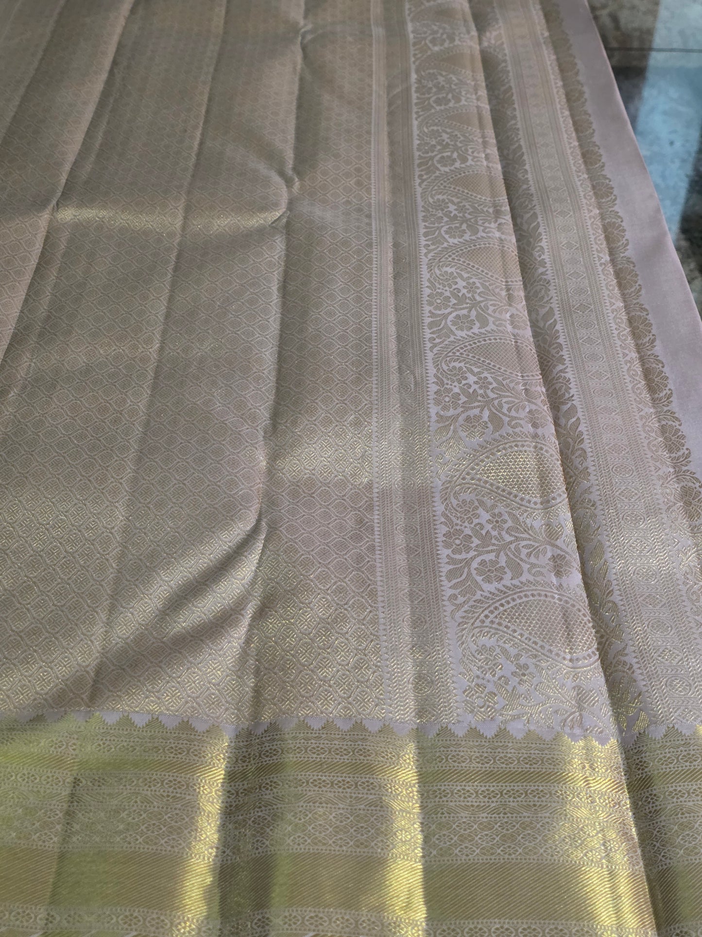 Pure Mulberry silk saree light grey and gilden colour with pure zari completely hand woven.