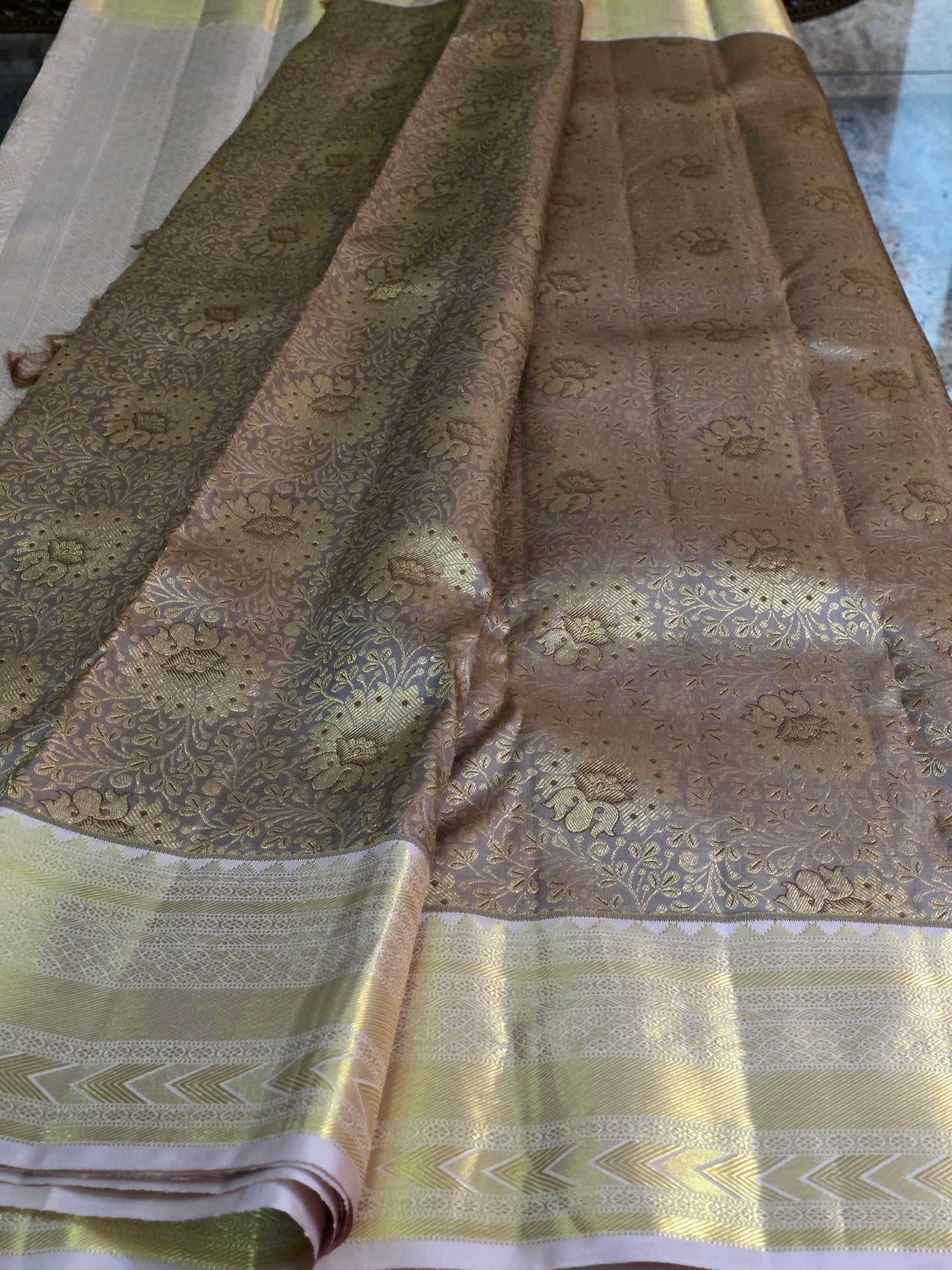 Pure Mulberry silk saree light grey and gilden colour with pure zari completely hand woven.