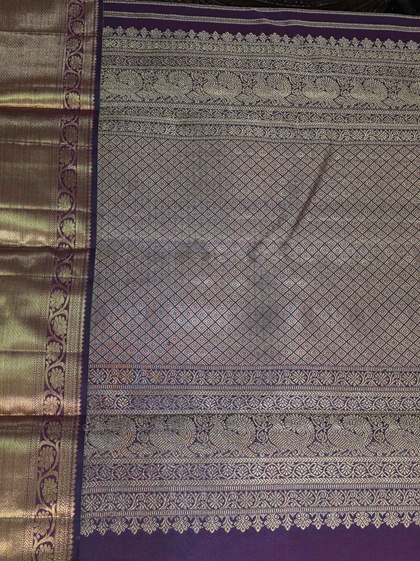 Pure Mulberry brown and maroon dual tone colour silk saree with pure zari completely hand woven.