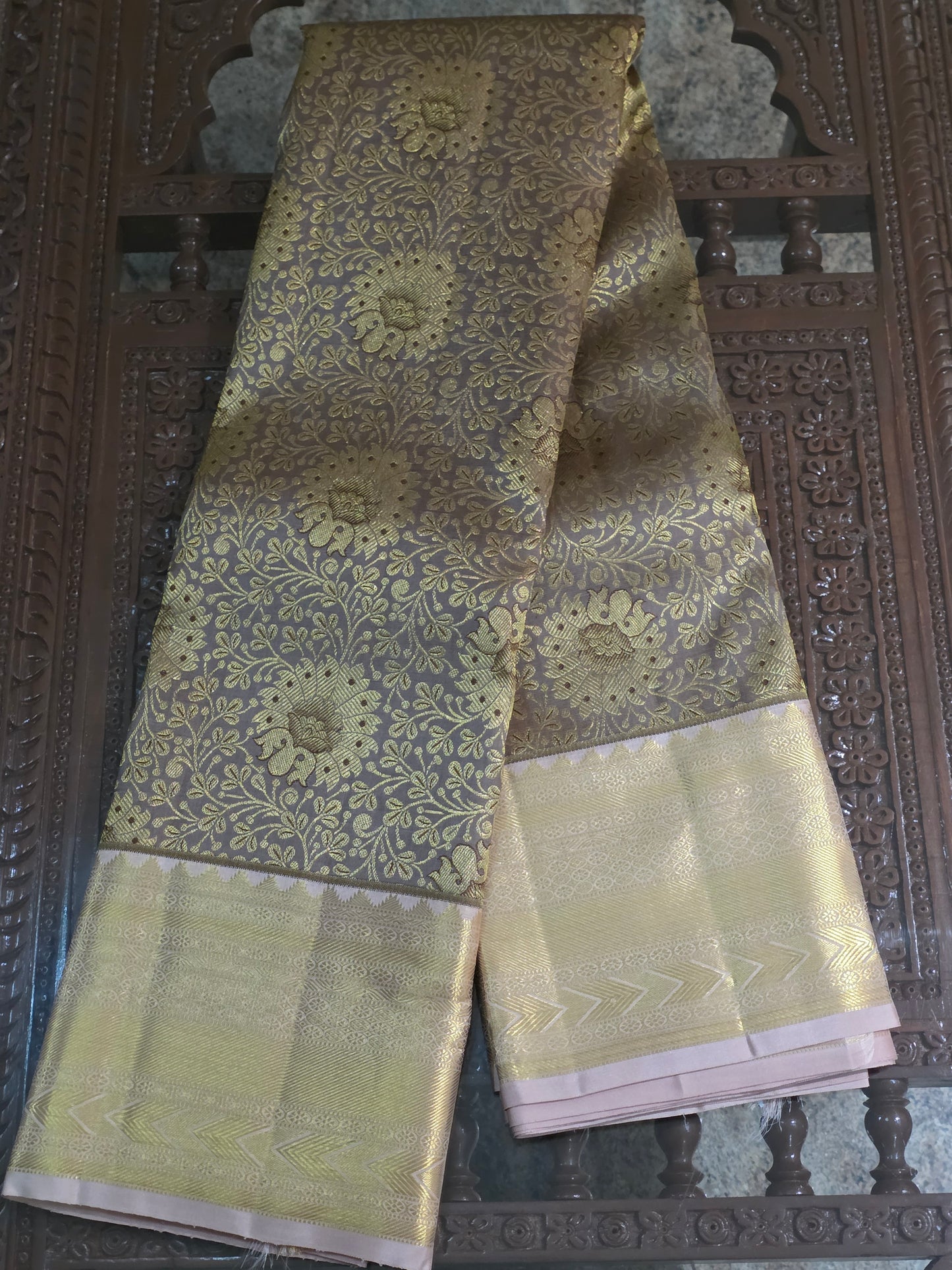 Pure Mulberry silk saree light grey and gilden colour with pure zari completely hand woven.