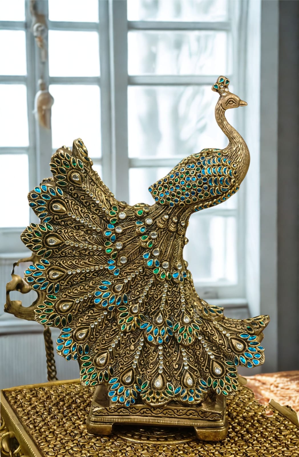 Peacock statue studded with  jewelstones