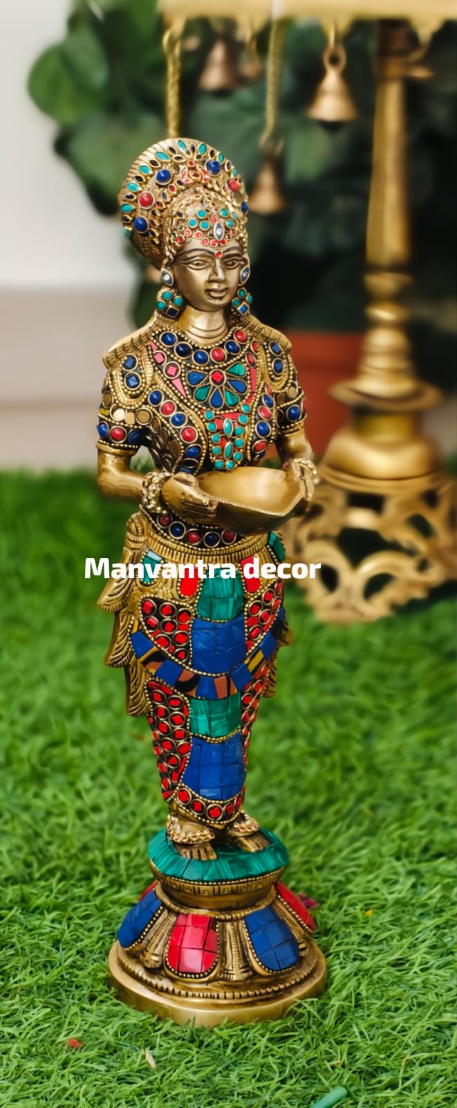 Deeplady in pure brass with stonework