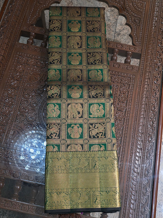 Pure Mulberry dual tone green colour silk saree with pure zari completely hand woven.