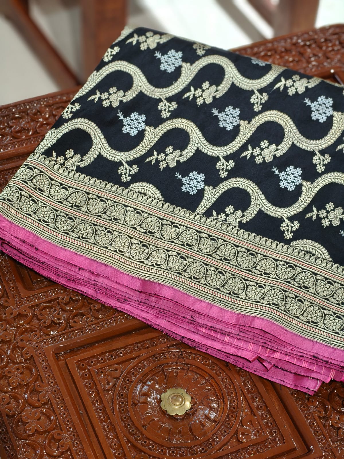 Pure Mulberry silk black with golden and silver zari work throughout the saree. 100% pure silk with pure zari completely hand weaved