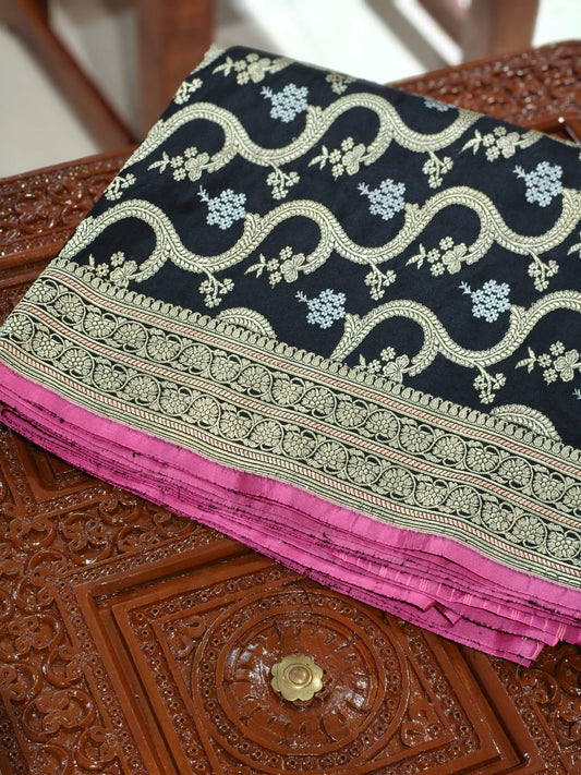 Pure Mulberry silk black with golden and silver zari work throughout the saree. 100% pure silk with pure zari completely hand weaved