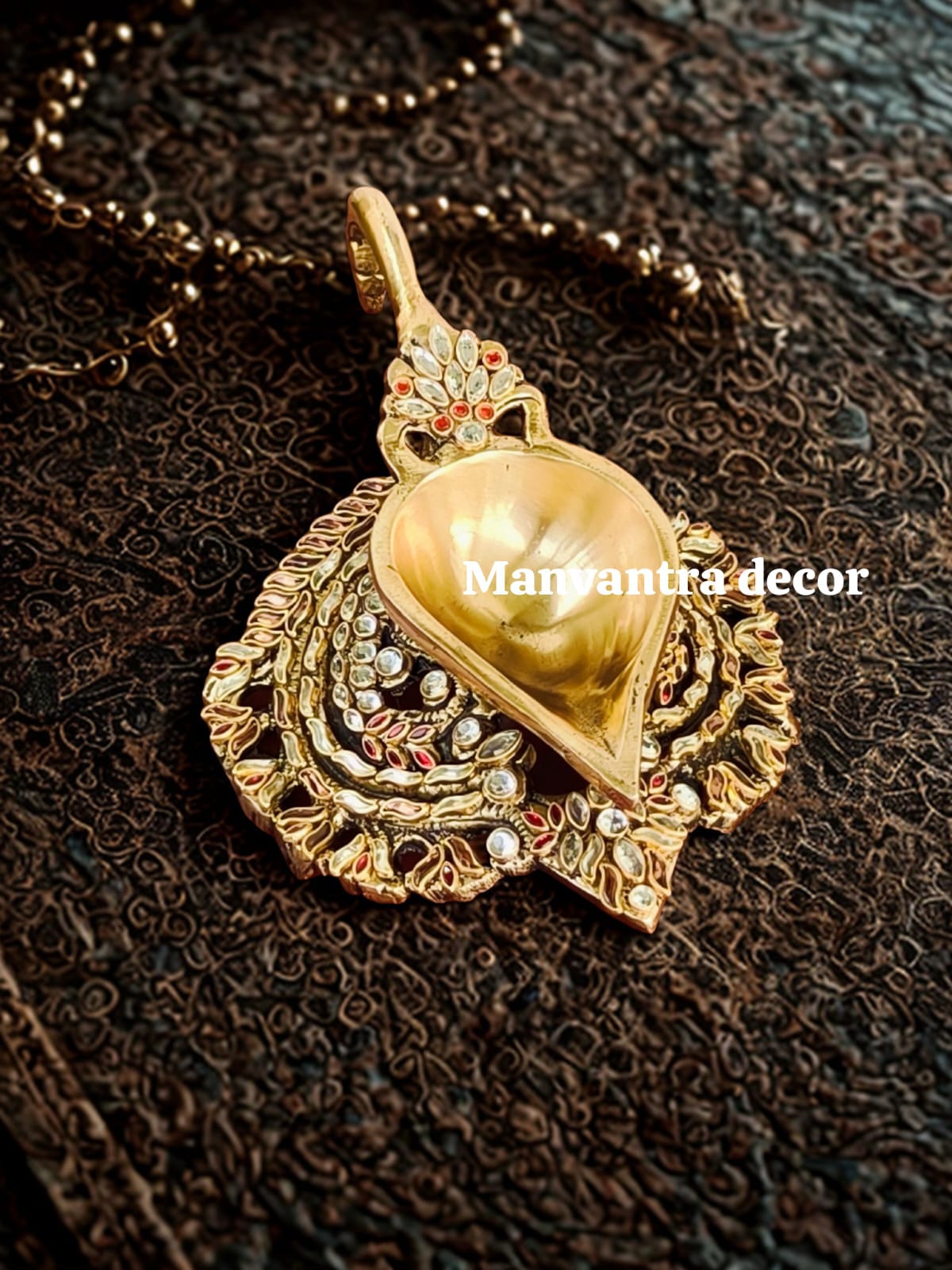 Beautiful shimmering deepams in brass studded with special stone work by hand (pair)