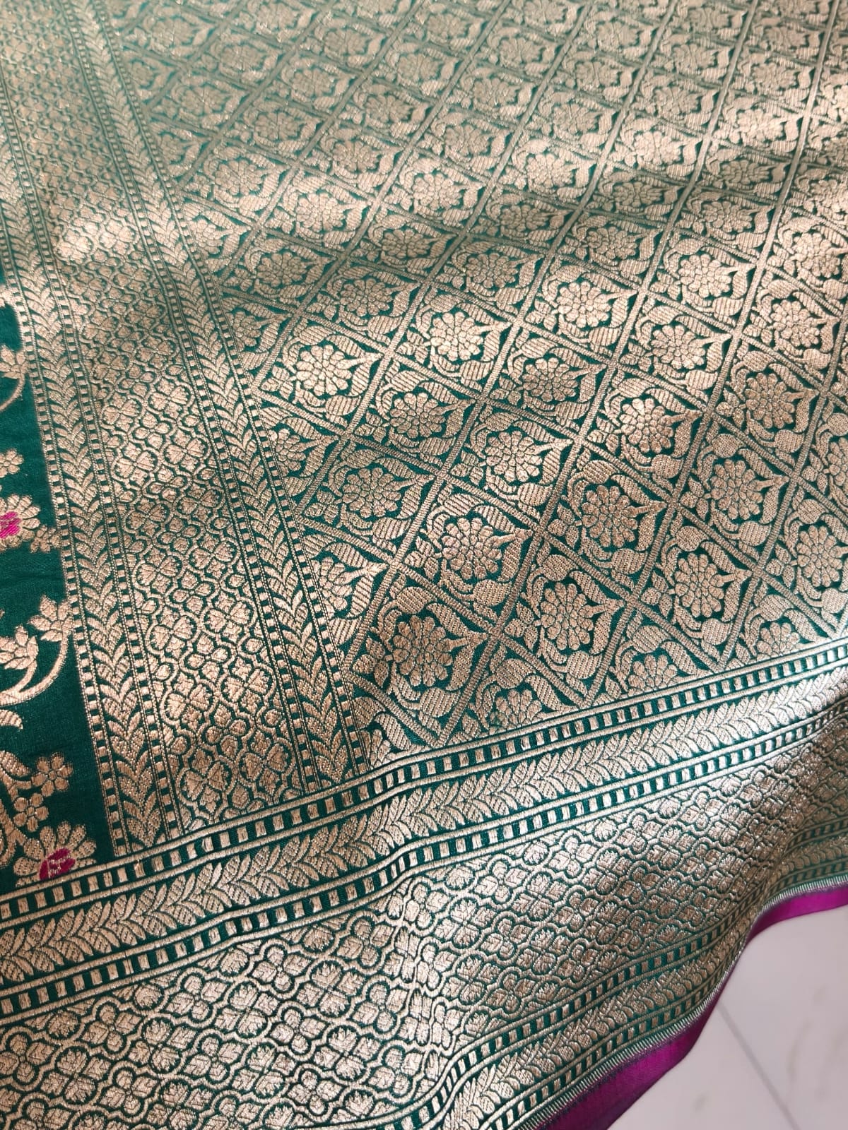 Pure Mulberry silk green with golden and silver zari work throughout the saree. 100% pure silk with pure zari completely hand woven
