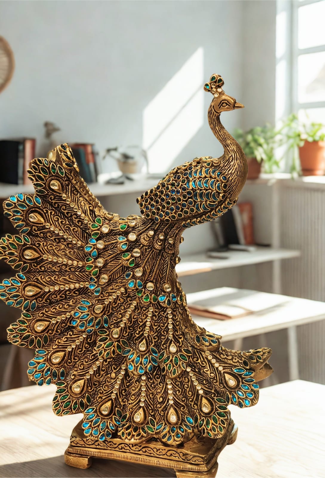 Peacock statue studded with  jewelstones