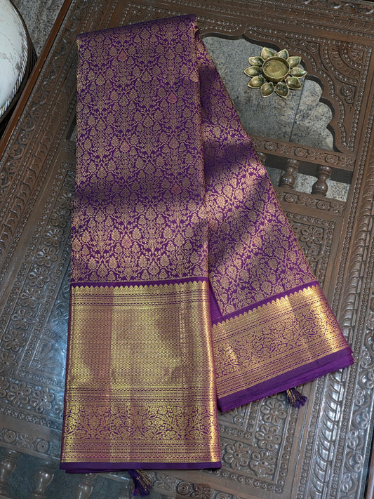 Pure Mulberry silk saree purple colour and golden pure zari completely hand woven.