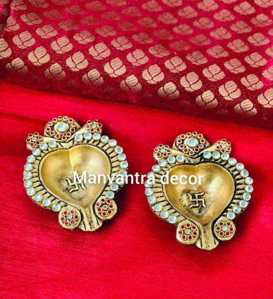 Beautiful diyas , brass, with stonework in pure brass(pair)