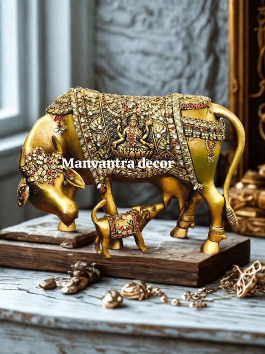 Cow calf with Lakshmi Ganesh idol carved, with beautiful kundan work in pure brass