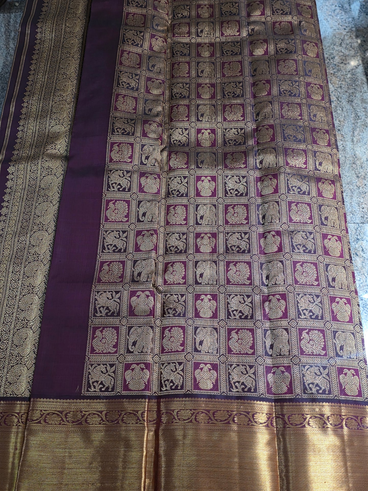 Pure Mulberry brown and maroon dual tone colour silk saree with pure zari completely hand woven.