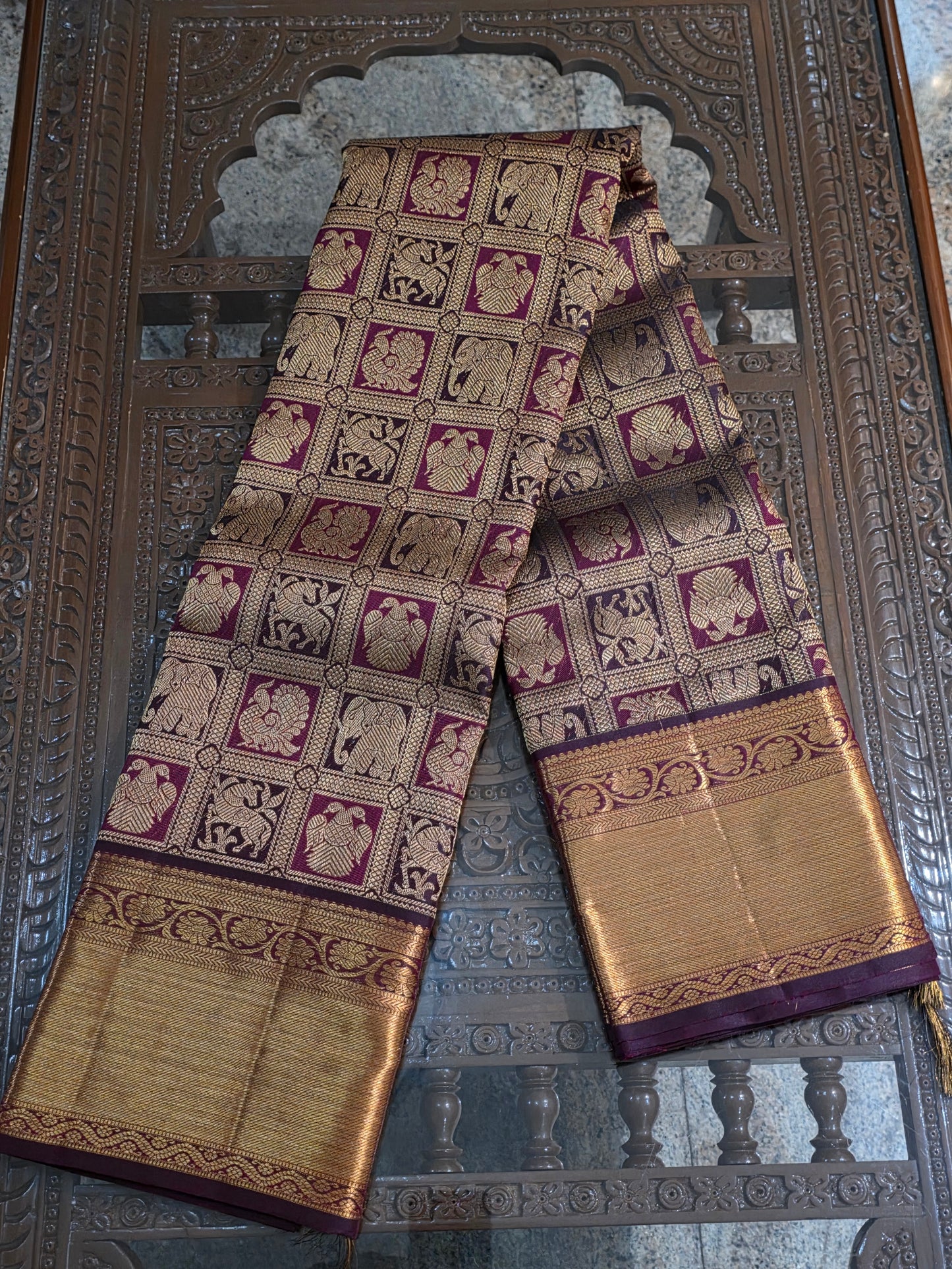 Pure Mulberry brown and maroon dual tone colour silk saree with pure zari completely hand woven.
